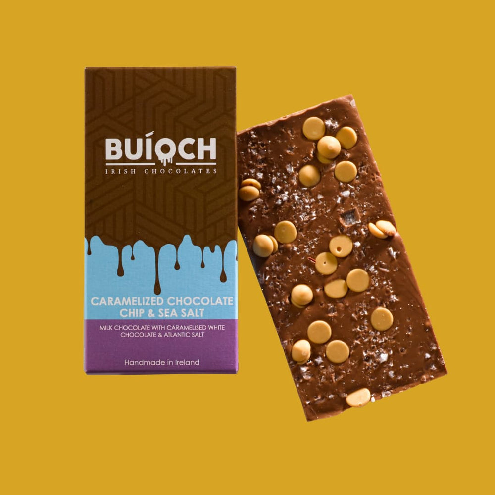 
                  
                    Milk Chocolate Honeycomb Hex - Packaging on a gold background. Handmade by Buíoch Irish Chocolates.
                  
                