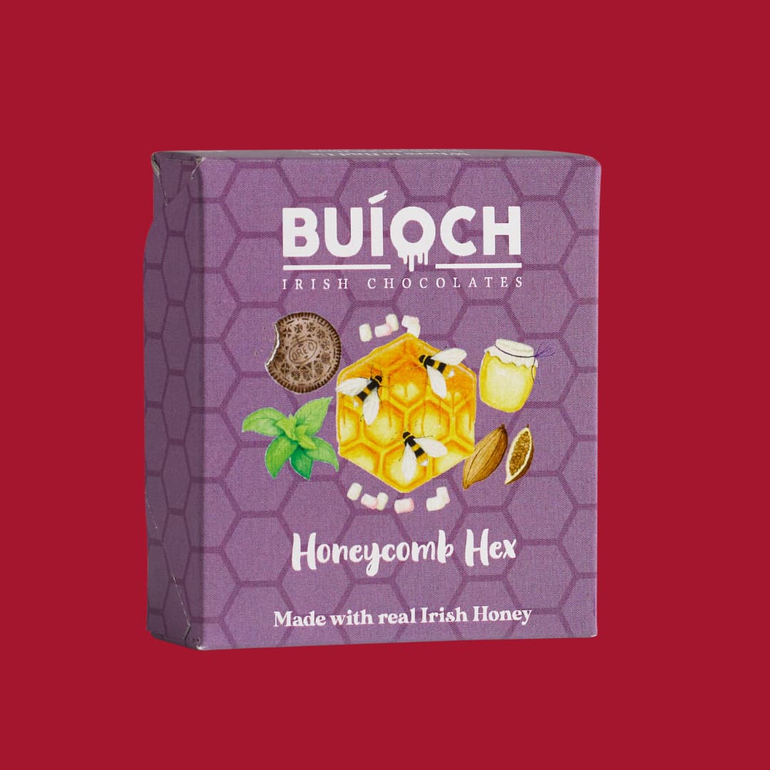 Milk Chocolate Marshmallow Honeycomb Hex - Packaging on a red background. Handamde by Buíoch Irish Chocolates.
