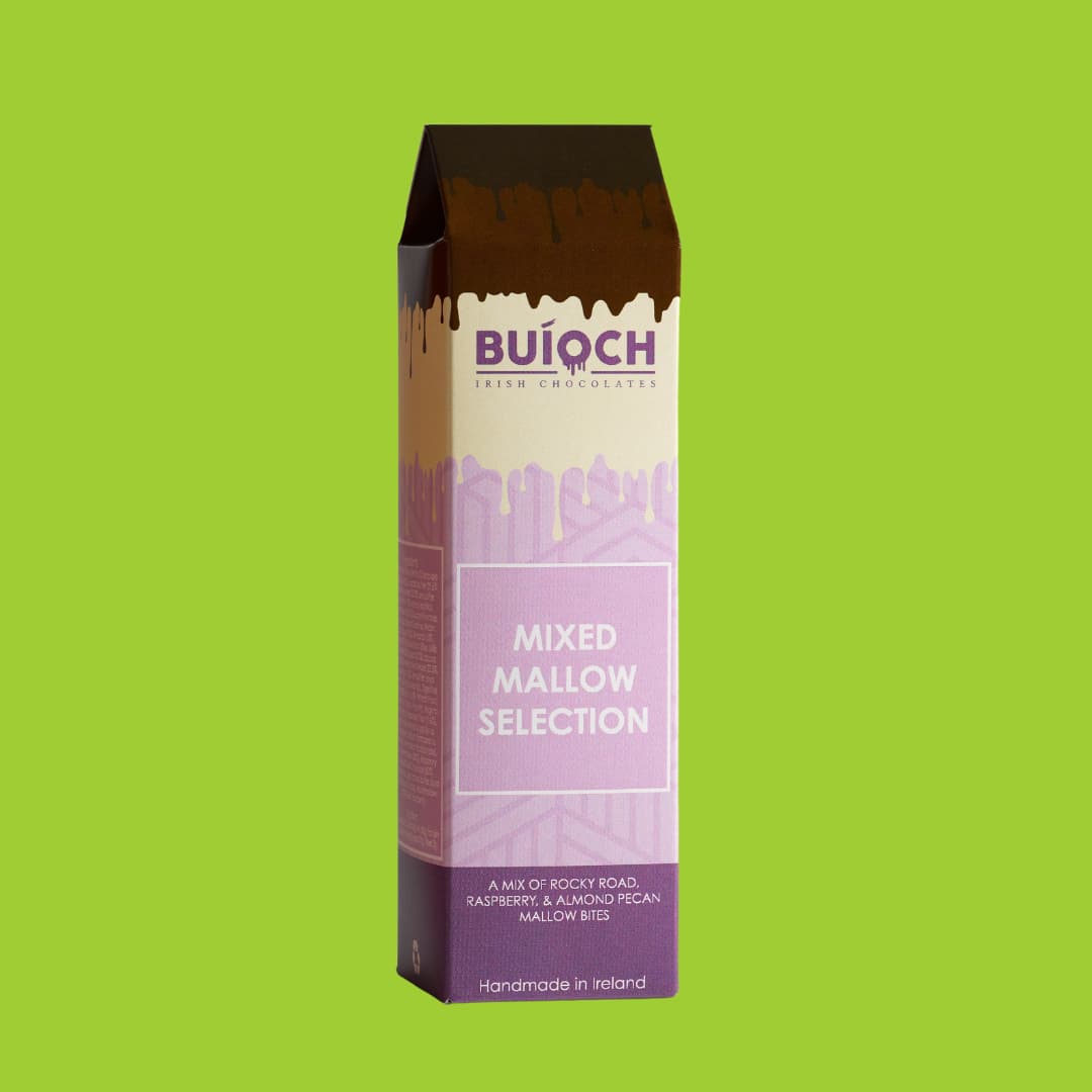 Mixed mallow selection. Milk chocolate rocky road mallow bites, white chocolate almond and pecan mallow bites and dark chocolate raspberry mallow bites. Handamde by Buíoch Irish Chocolates. Packaging on a lime green background.