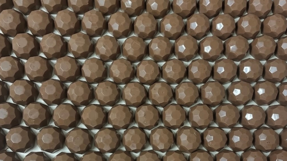 Rows of individually wrapped chocolate favours