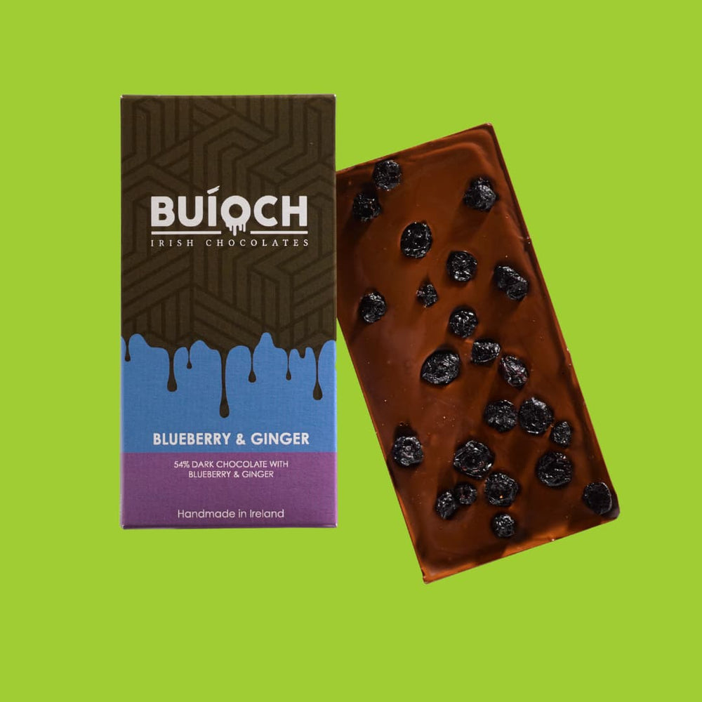 Blueberry and Ginger Bar - 54% dark chocolate with blueberries and ginger. Handmade by Buíoch Irish Chocolates. Packaging and bar on a lime green background.