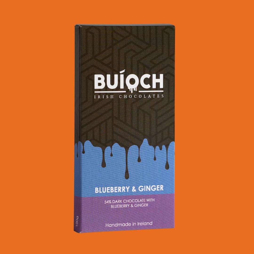 
                  
                    Blueberry and Ginger Bar - 54% dark chocolate with blueberries and ginger. Handmade by Buíoch Irish Chocolates. Packaging on an orange background.
                  
                
