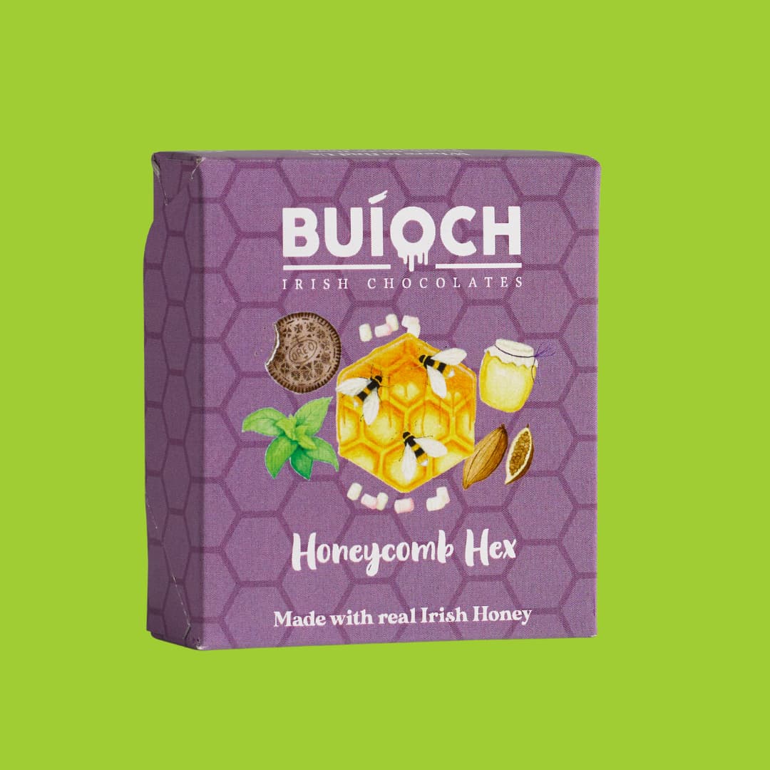 Milk Chocolate Honeycomb Hex - Packaging on a lime green background. Handamde by Buíoch Irish Chocolates.