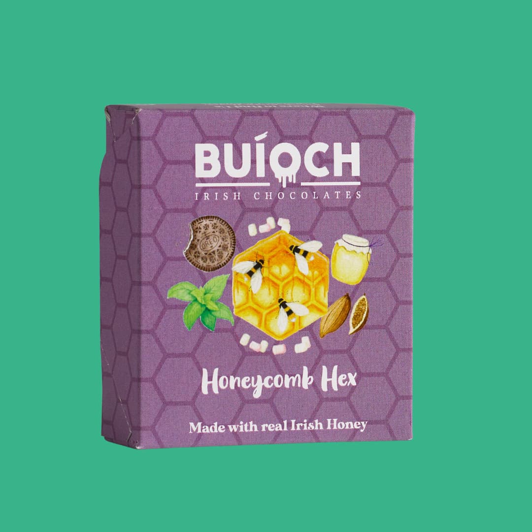 
                  
                    Milk Chocolate Mint Honeycomb Hex - Packaging on a mint green background. Handmade by Buíoch Irish Chocolates.
                  
                