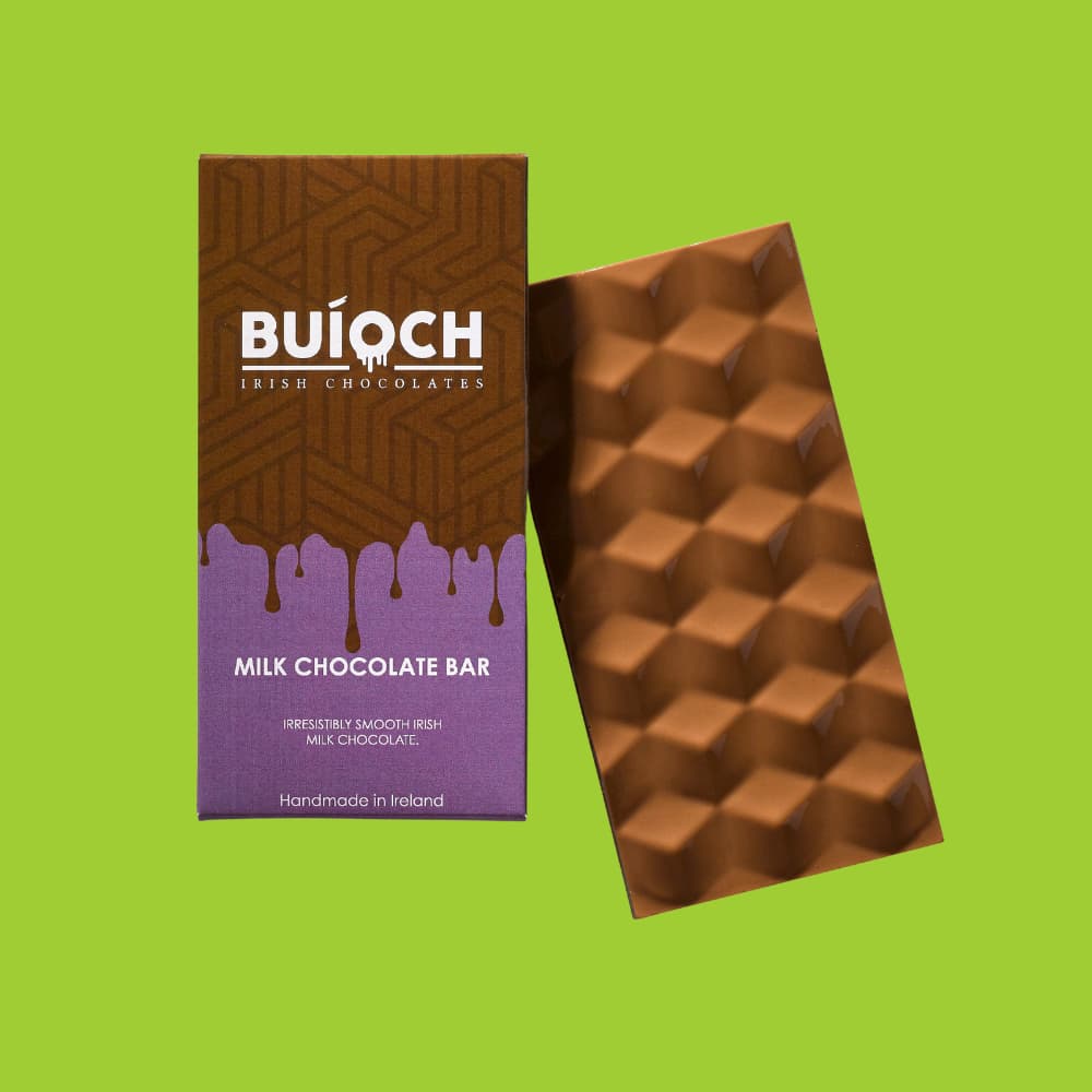 Milk Chocolate Bar. Handmade by Buíoch Irish Chocolates. Packaging and bar on a lime green background.