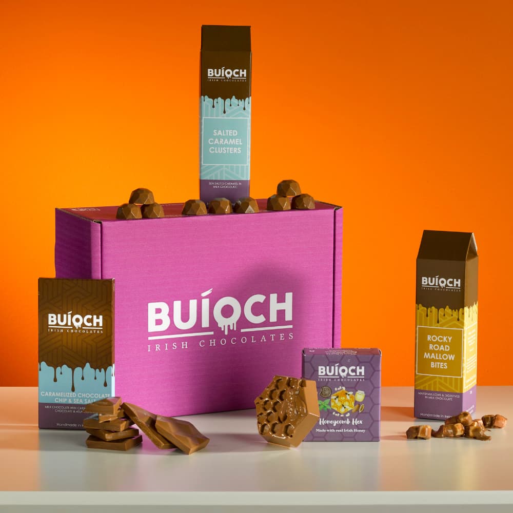 Buioch Irish Chocolates The Favourites Chocolate Gift Bundle. Includes our handmade Salted Caramel Clusters, Rocky Road Mallow Bites, Caramelised chocolate chip and Sea Salt Bar and our Milk Chocolate Honeycomb Hex. 